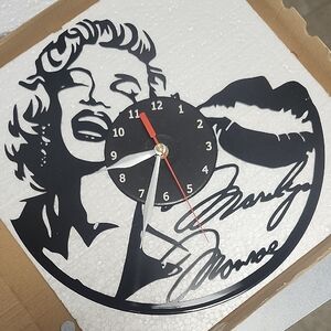 Black Wall Clock with Iconic Design